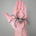 handcrafted decorative spider made from black, silver, and iridescent beads, designed as a unique ornament or collectible art piece.